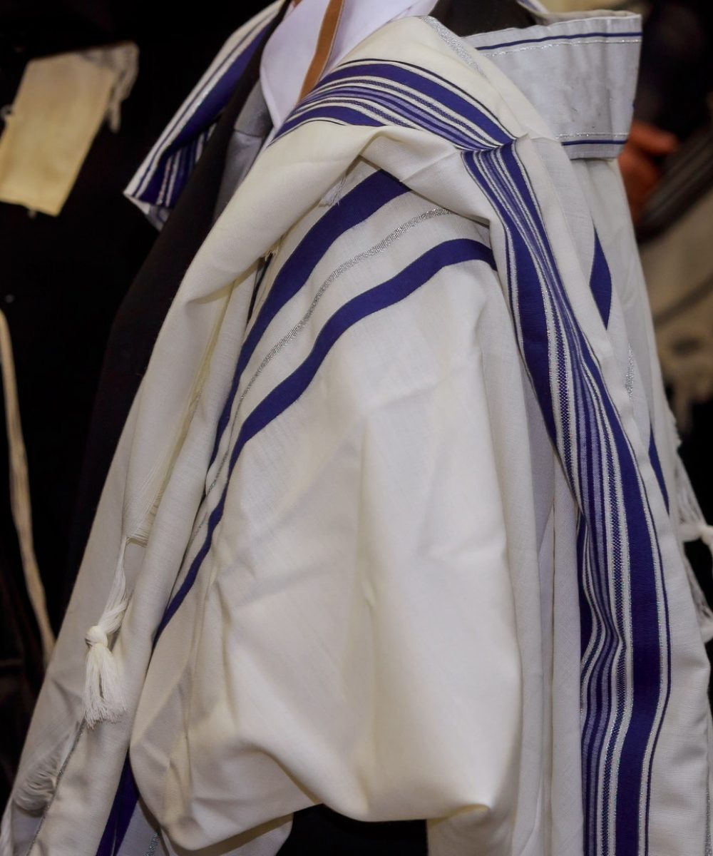 prayer Orthodox hassidic Jews pray in a holiday robe and tallith the synagogue